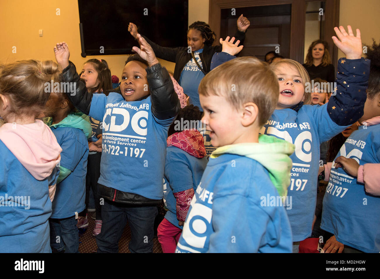 Preschoolers from the Seymour Johnson Child Development Center sing a