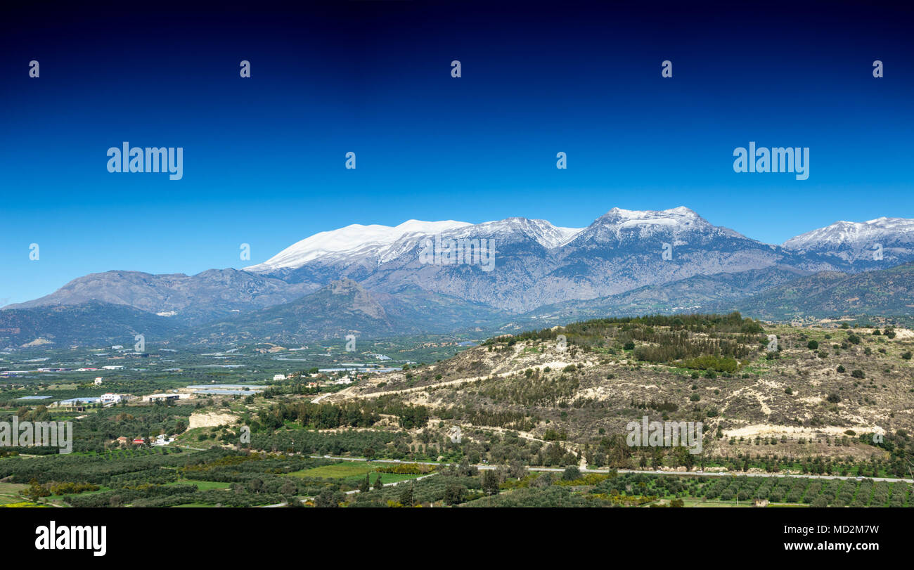 Scenic landscape with snow clad mountain, Greece Stock Photo