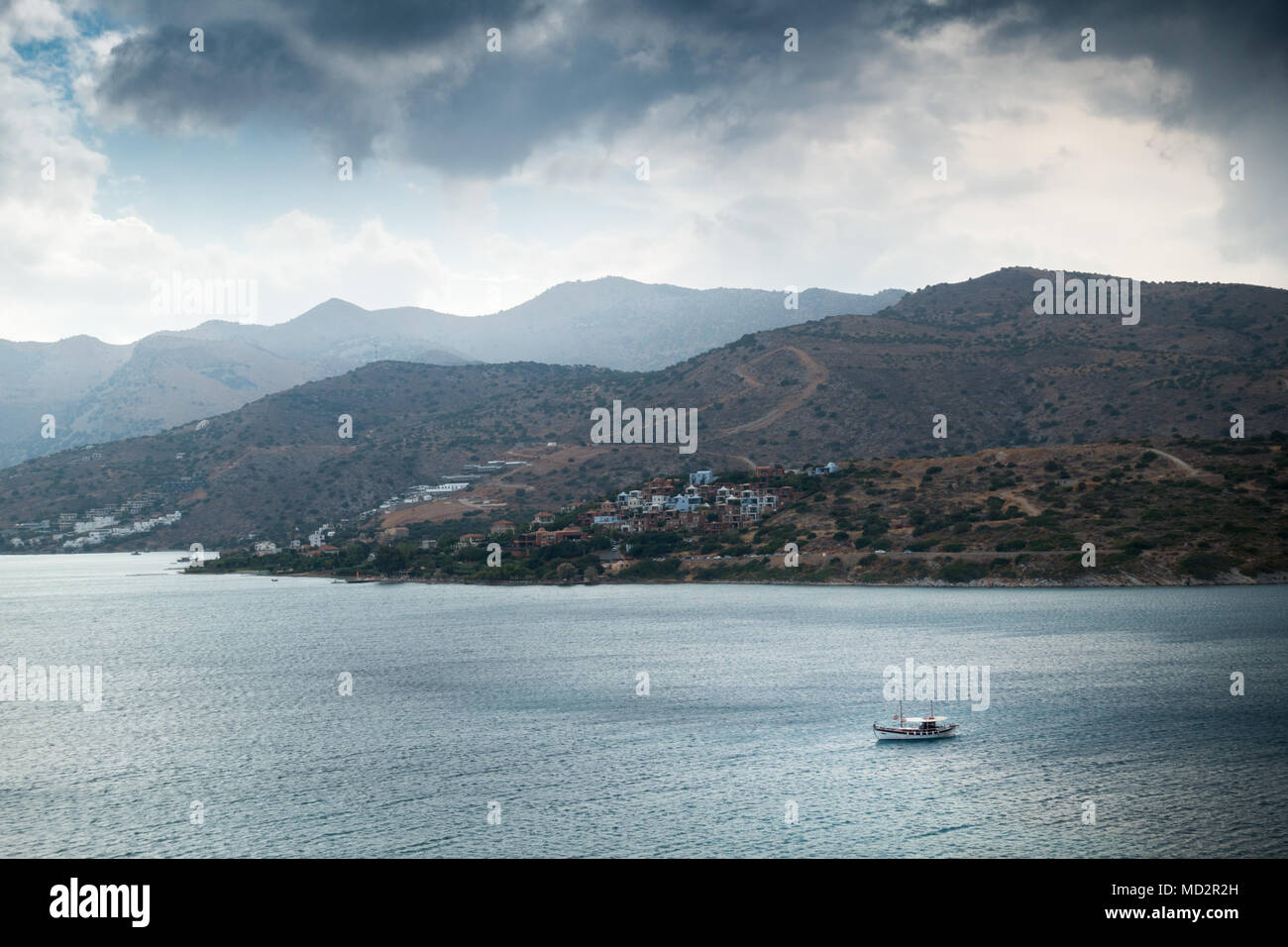 Seascape and mountain against cloudy sky in Crete, Greece Stock Photo