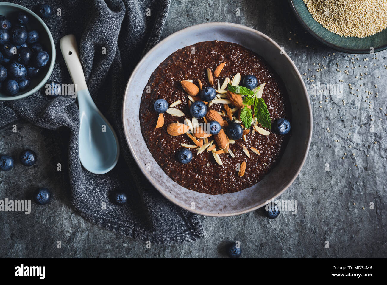 Healthy chocolate Quinoa porridge with coconut milk, honey, almonds and