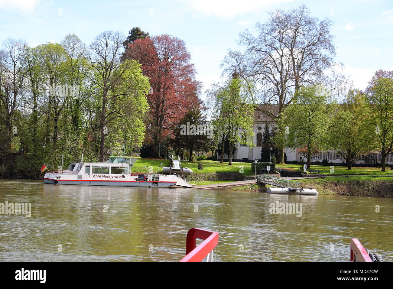 On the Island Nonnenwerth near Remagen, Germany, students are educated at a High School. Students and teachers have to travel everyday by ferry. Stock Photo