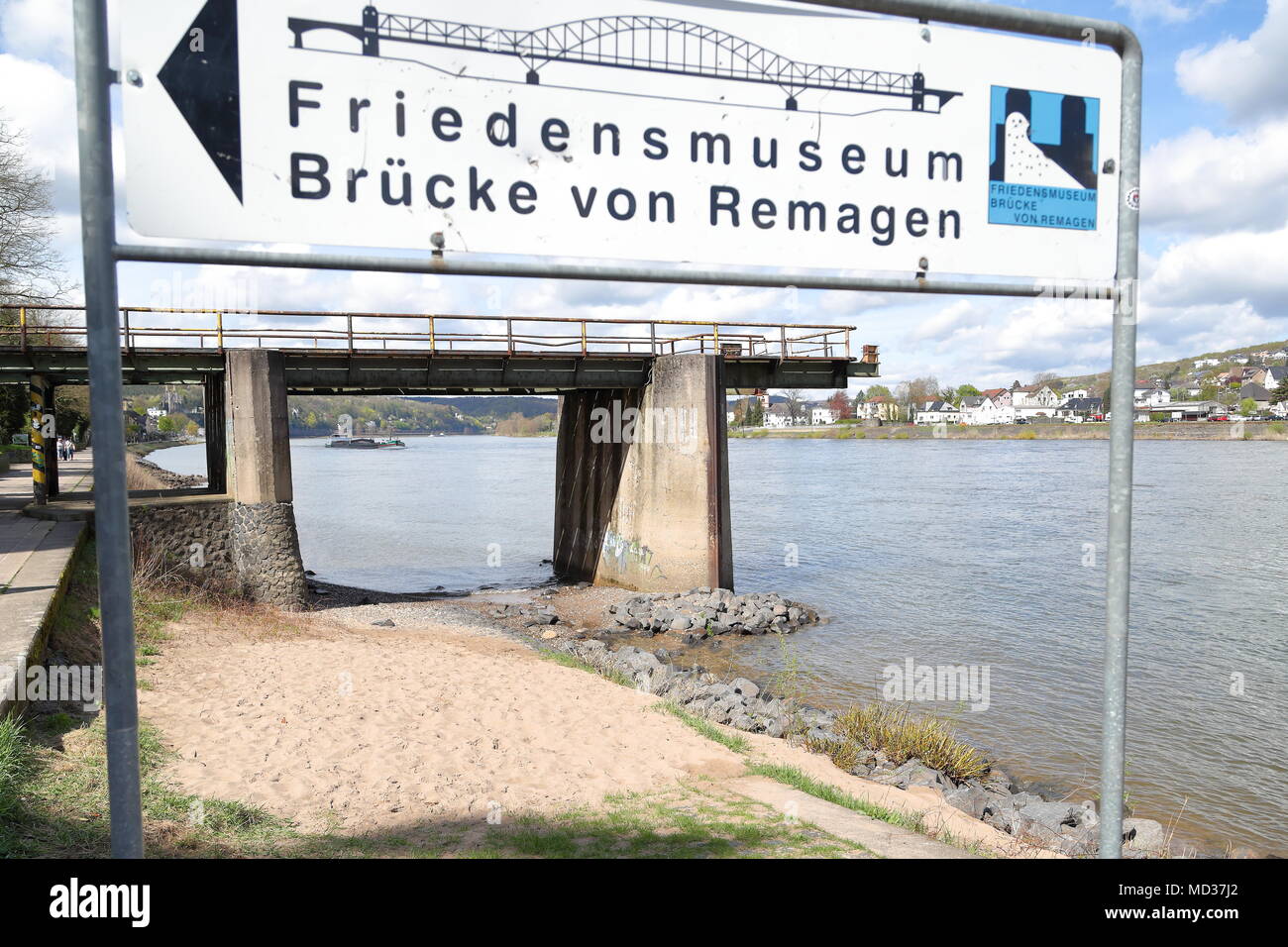 The remains of the bridge at Remagen, Germany, which was embattled during Worldwar II. A sign points the way to the museum for peace. Stock Photo
