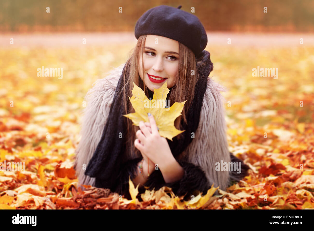Autumn Woman Lying on Autumn Leaves in the Park Outdoors Stock Photo ...