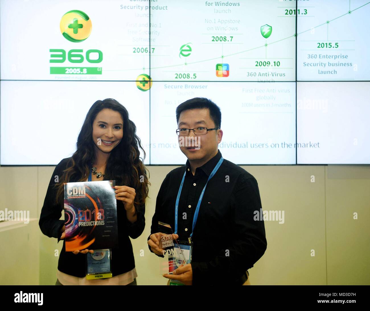 San Francisco, USA. 17th Apr, 2018. Cyber Defense Magazine (CDM) Marketing Director Sarah Brandow (L) presents the Cutting Edge Award trophy to 360 ESG President Wu Yunkun in San Francisco, the United States, April 17, 2018. China's leading Internet security company, 360 Enterprise Security Group (360 ESG), Tuesday was honored with the Cutting Edge Award for its outstanding achievements in Internet endpoint security at an annual global information security conference here. Credit: Wu Xiaoling/Xinhua/Alamy Live News Stock Photo