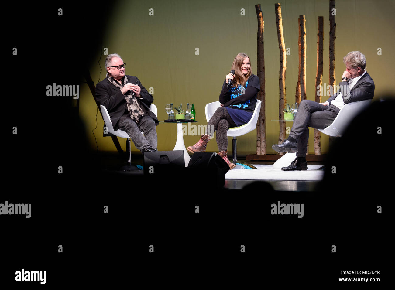 17 April 2018, Stuttgart, Germany: Heinz Rudolf Kunze (L-R), Judith Holofernes, and Martin Bohus, professor für psychotherapy, speaking during the event 'Sprechstunde im Theaterhaus'. The participants are using the talk show format to talk about perceived stress and stress management. Photo: Sina Schuldt/dpa Stock Photo