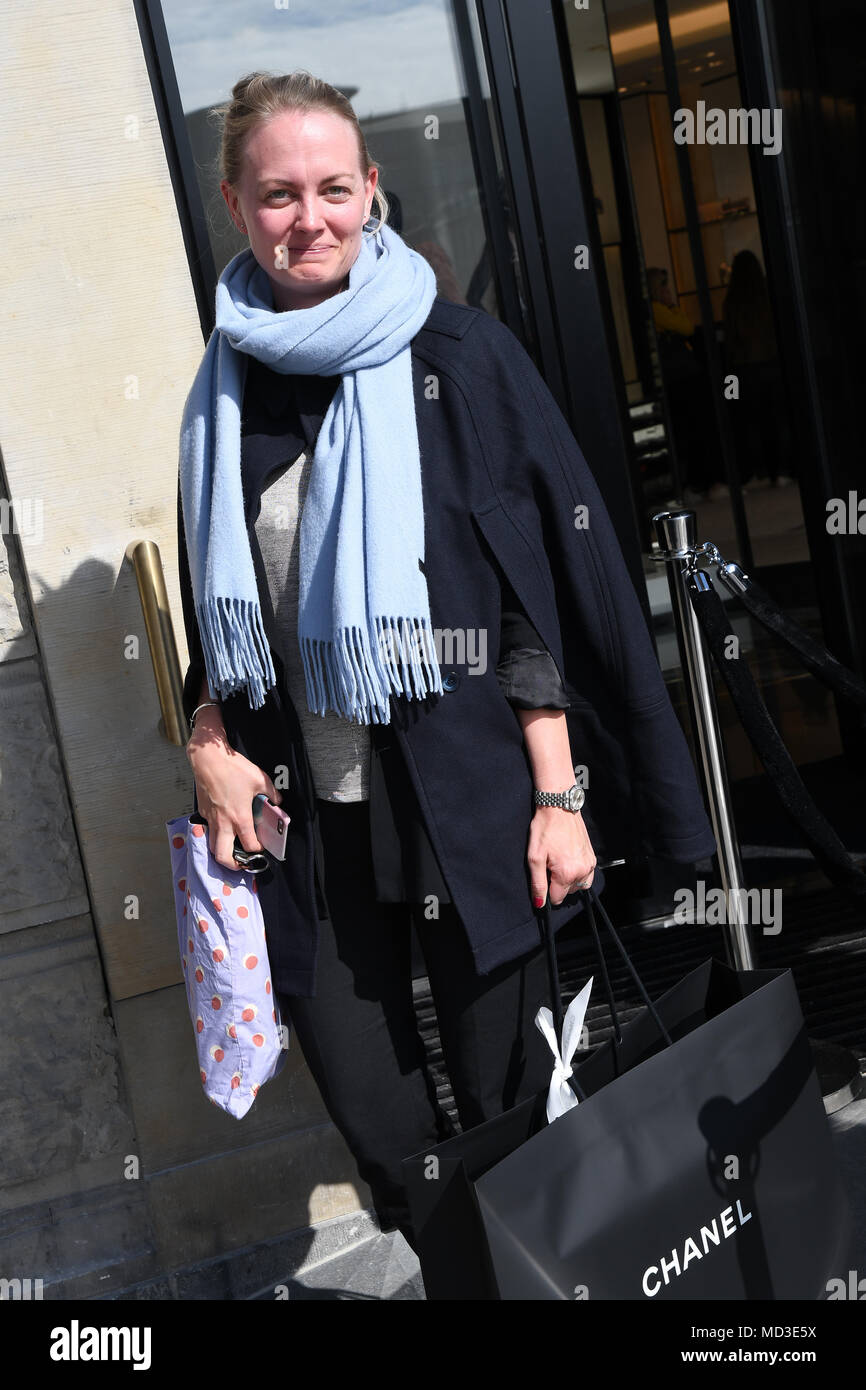 Copenhagen, Denmark. 18th Apr, 2018. French chain Chanel opens its first shop ever in Copenhagen first consumer with Chanel shopping bag and consumer waiting outside in line at chanel shop to shopping today on its first day of Chanel business in Copenhagen Denmaerk.. (Photo.Francis Joseph Dean / Deanpictures. Credit: Francis Joseph Dean / Deanpictures/Alamy Live News Stock Photo
