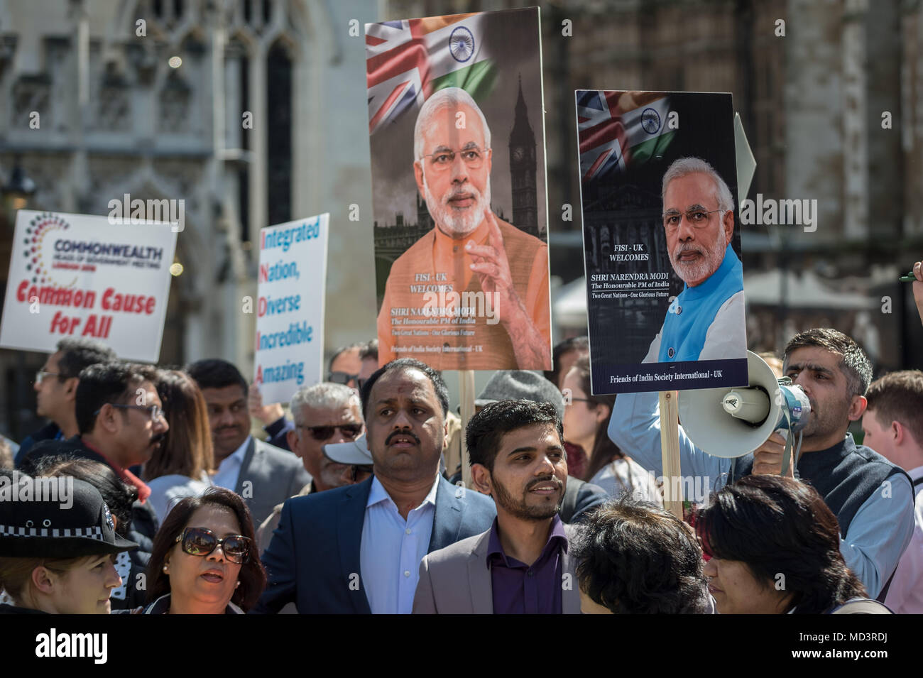 London, UK. 18th April, 2018. Modi supporters demonstrate with flags ...