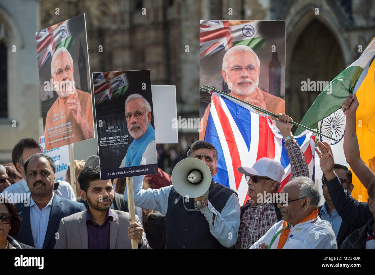 London, UK. 18th April, 2018. Modi supporters demonstrate with flags ...