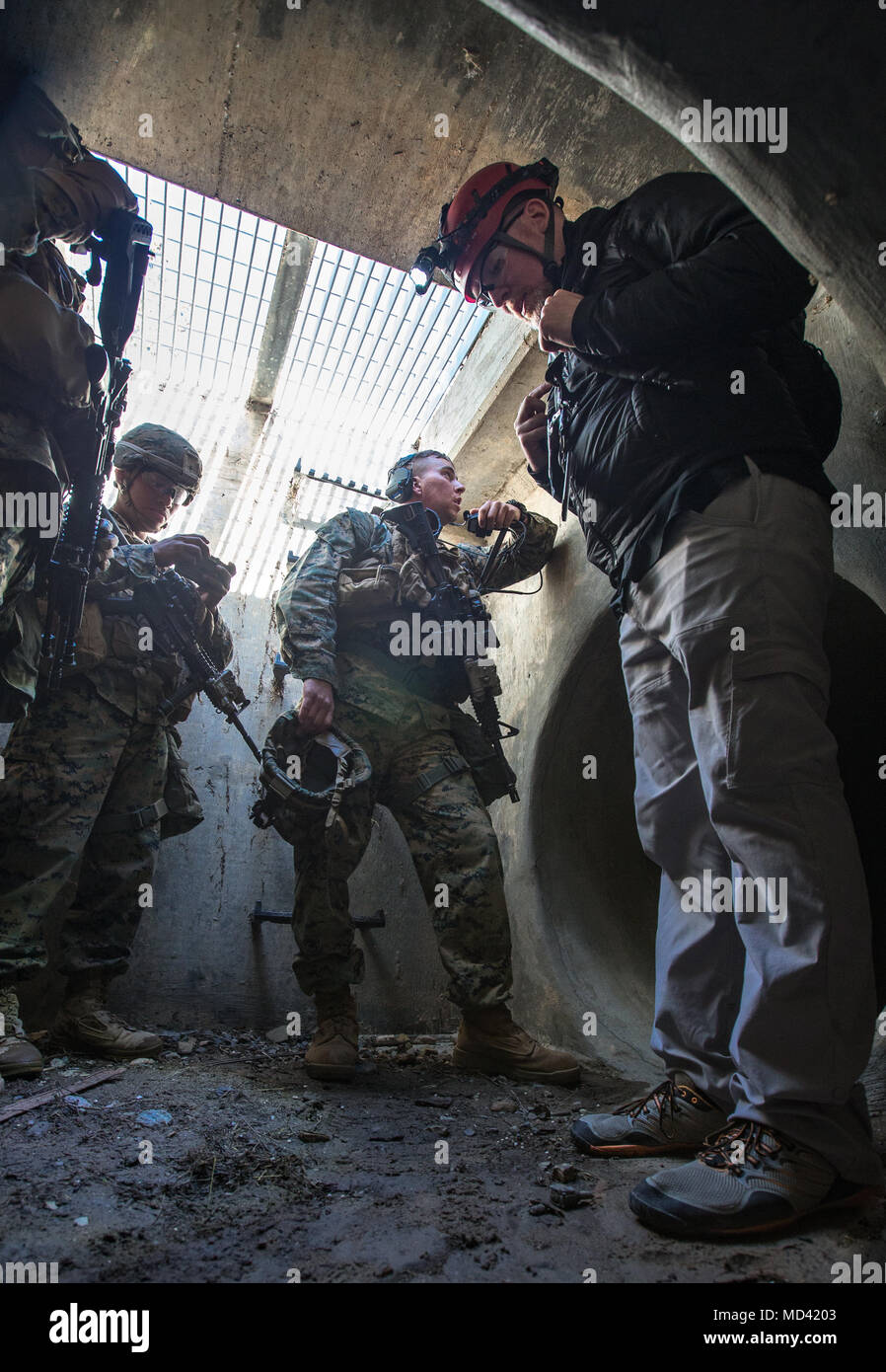 U.S. Marines with 3rd Battalion, 4th Marine Regiment, 1st Marine Division utilizes a communication system during Urban Advanced Naval Technology Exercise 2018 (ANTX18) at Marine Corps Base Camp Pendleton, California, March 19, 2018. The Marines are testing next generation technologies to provide the opportunity to assess the operational utility of emerging technologies and engineering innovations that improve the Marine’s survivability, lethality and connectivity in complex urban environments. (U.S. Marine Corps photo by Lance Cpl. Rhita Daniel) Stock Photo