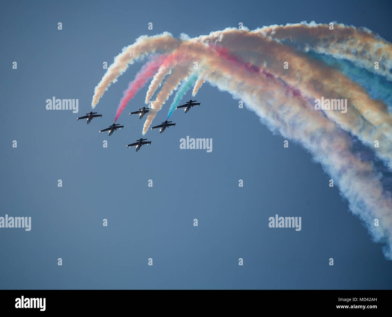 The 2018 Yuma Airshow headliner, The Patriots Jet Team, perform an acrobatic aerial display for spectators during the 2018 Yuma Airshow hosted by Marine Corps Air Station Yuma, Ariz., Saturday, March 17, 2018. The airshow is MCAS Yuma's only military airshow of the year and provides the community an opportunity to see thrilling aerial and ground performers for free while interacting with Marines and Sailors. (U.S. Marine Corps photo by Lance Cpl. Sabrina Candiaflores) Stock Photo