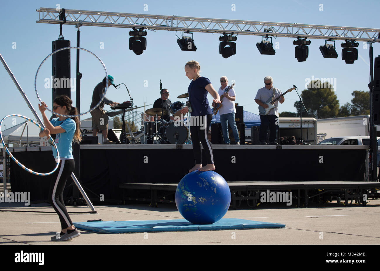 The Circus School of Arizona performs a show during the 2018 Yuma Airshow hosted by Marine Corps Air Station Yuma, Ariz., Saturday, March 17, 2018. The airshow is MCAS Yuma's only military airshow of the year and provides the community an opportunity to see thrilling aerial and ground performers for free while interacting with Marines and Sailors. (U.S. Marine Corps photo by Lance Cpl. Sabrina Candiaflores) Stock Photo