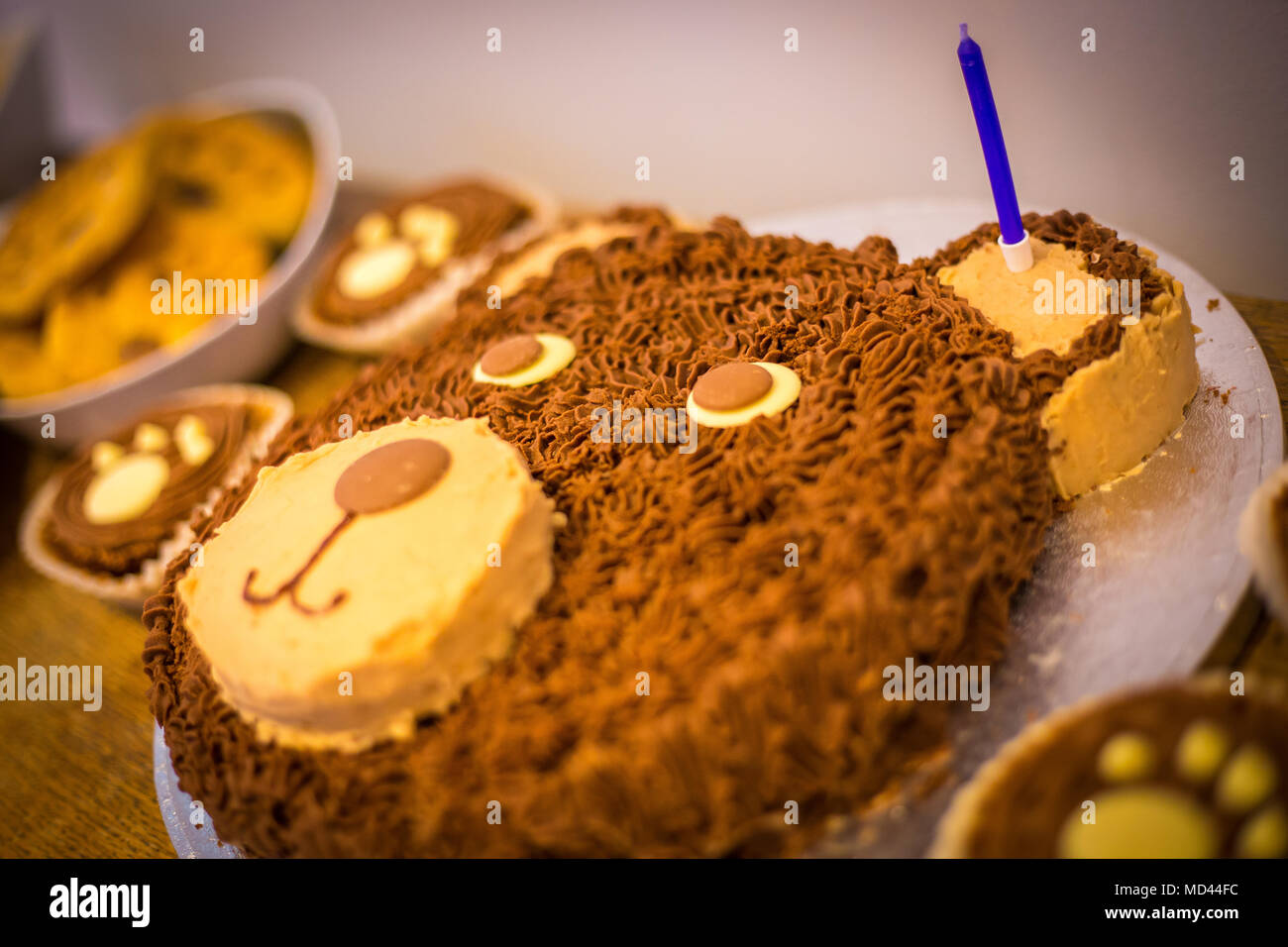 Childrens Teddy Bear Birthday Cake With One Candle Stock Photo Alamy