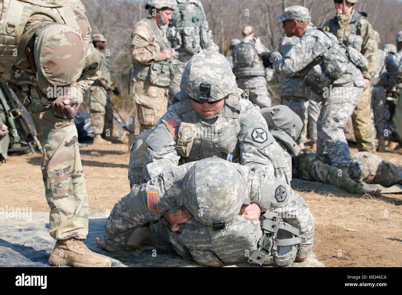 A U.S. Army Reserve Soldier performs a buddy carry on a simulated casualty during the Combat Support Training Exercise (CSTX) 78-18-03 at Fort Knox, Kentucky, March 15, 2018. CSTX 78-18-03 is a training exercise that ensures America's Army Reserve units and Soldiers are trained and ready to deploy on short-notice and bring capable, combat-ready and lethal firepower in support of the Army and our joint partners anywhere in the world. (U.S. Army Reserve photo by Spc. Torrance Saunders) Stock Photo