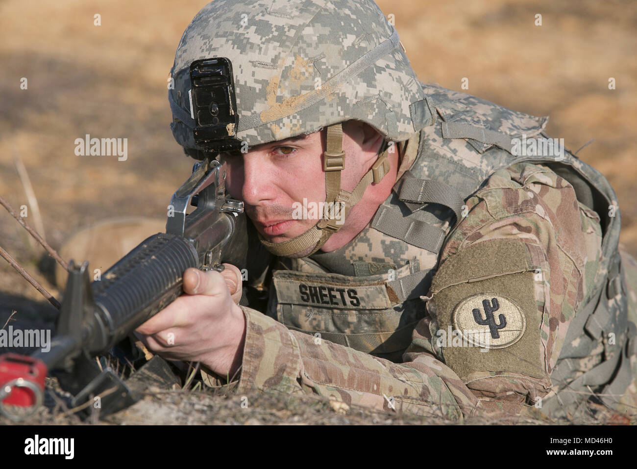 A U.S. Army Reserve Soldier aims his M16 rifle at a target, during a training event at Tactical Assembly Area Poorman during the Combat Support Training Exercise (CSTX) at Fort Knox, Kentucky, March 15, 2018. CSTX 78-18-03 is a training exercise that ensures America's Army Reserve units and Soldiers are trained and ready to deploy on short-notice and bring capable, combat-ready and lethal firepower in support of the Army and our joint partners anywhere in the world. (U.S. Army Reserve photo by Spc. Torrance Saunders) Stock Photo