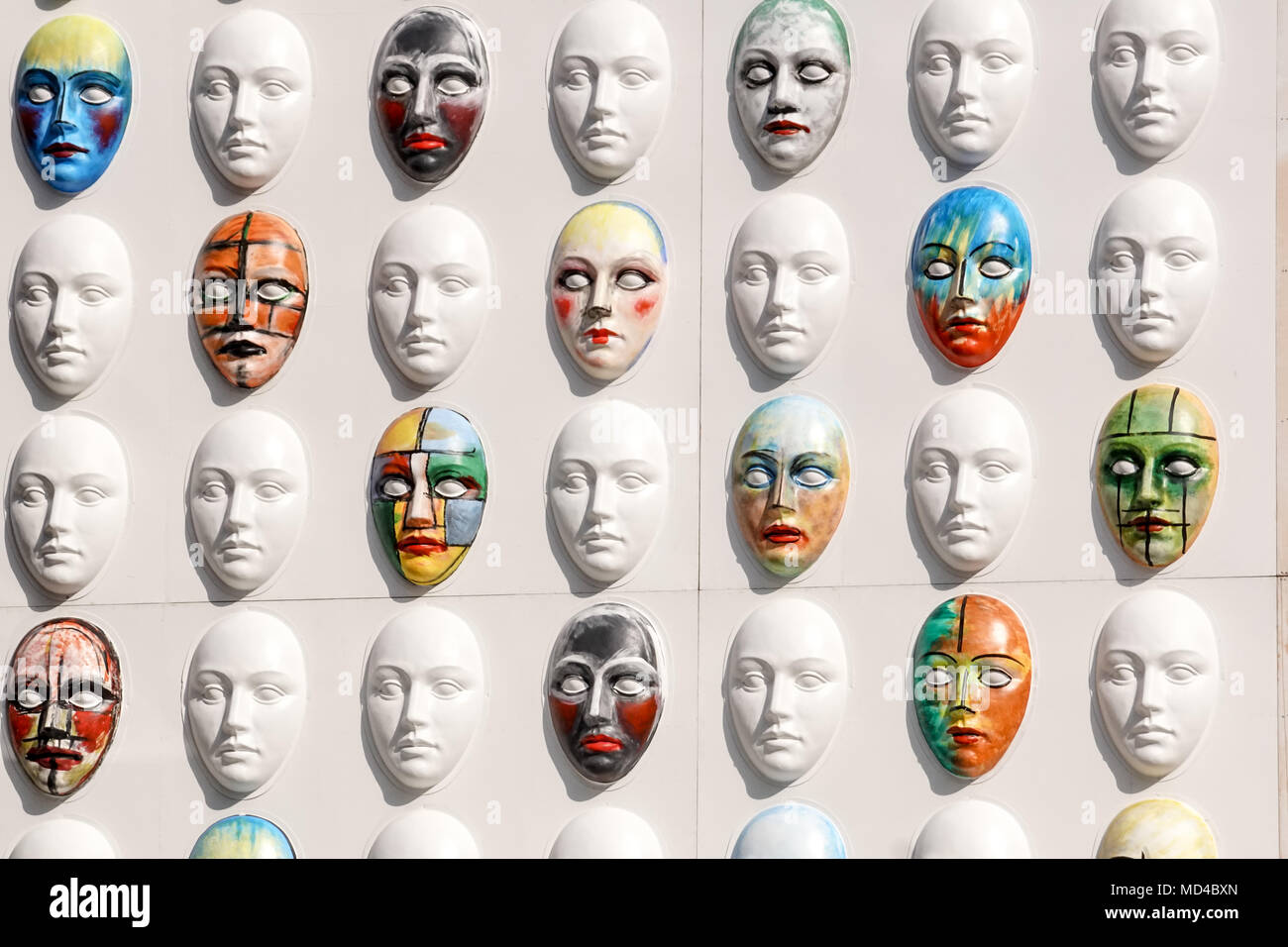 Carnival masks hanging on wall boards lie Stock Photo Alamy