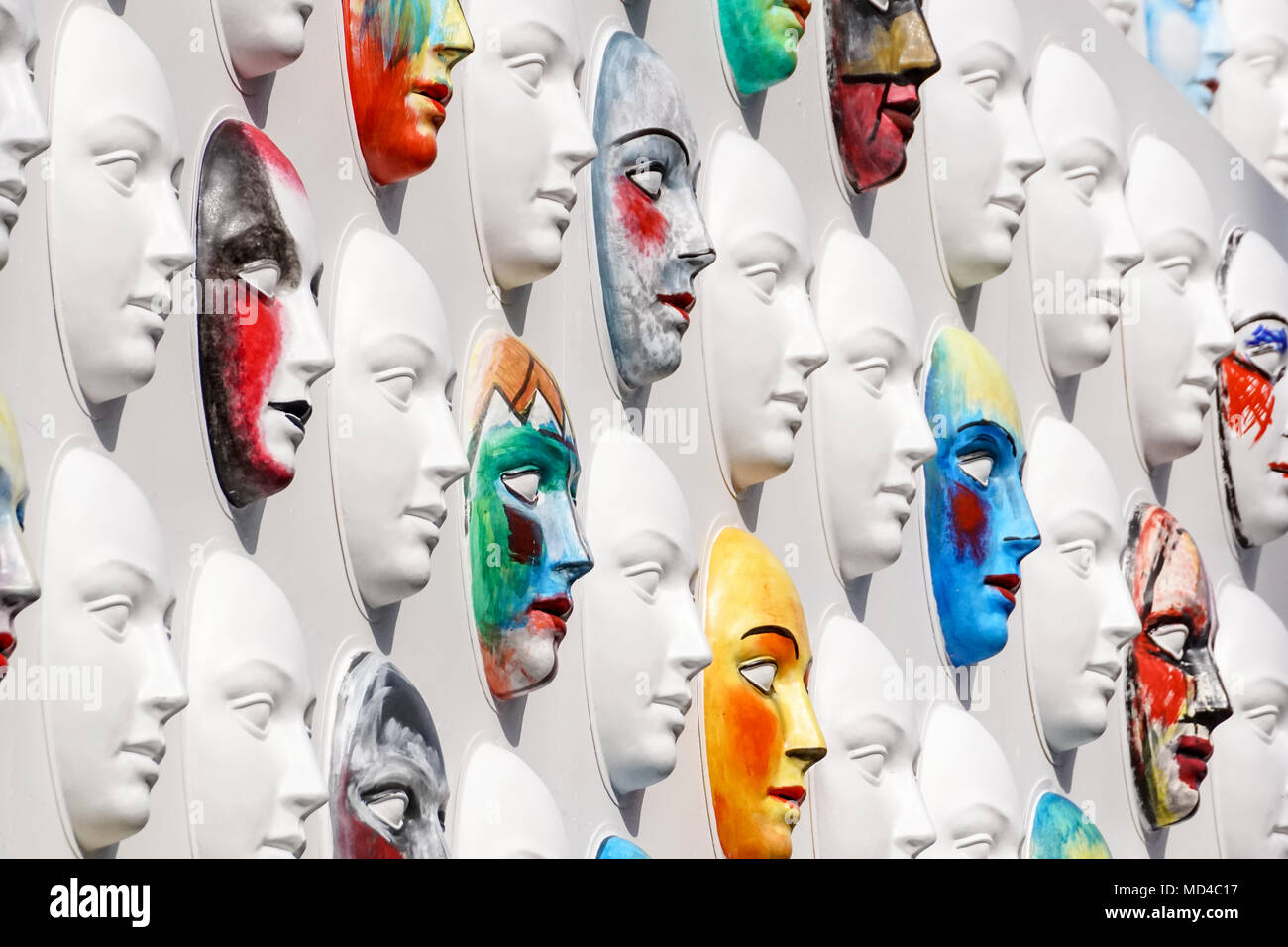 Carnival masks hanging on wall boards lie Stock Photo Alamy