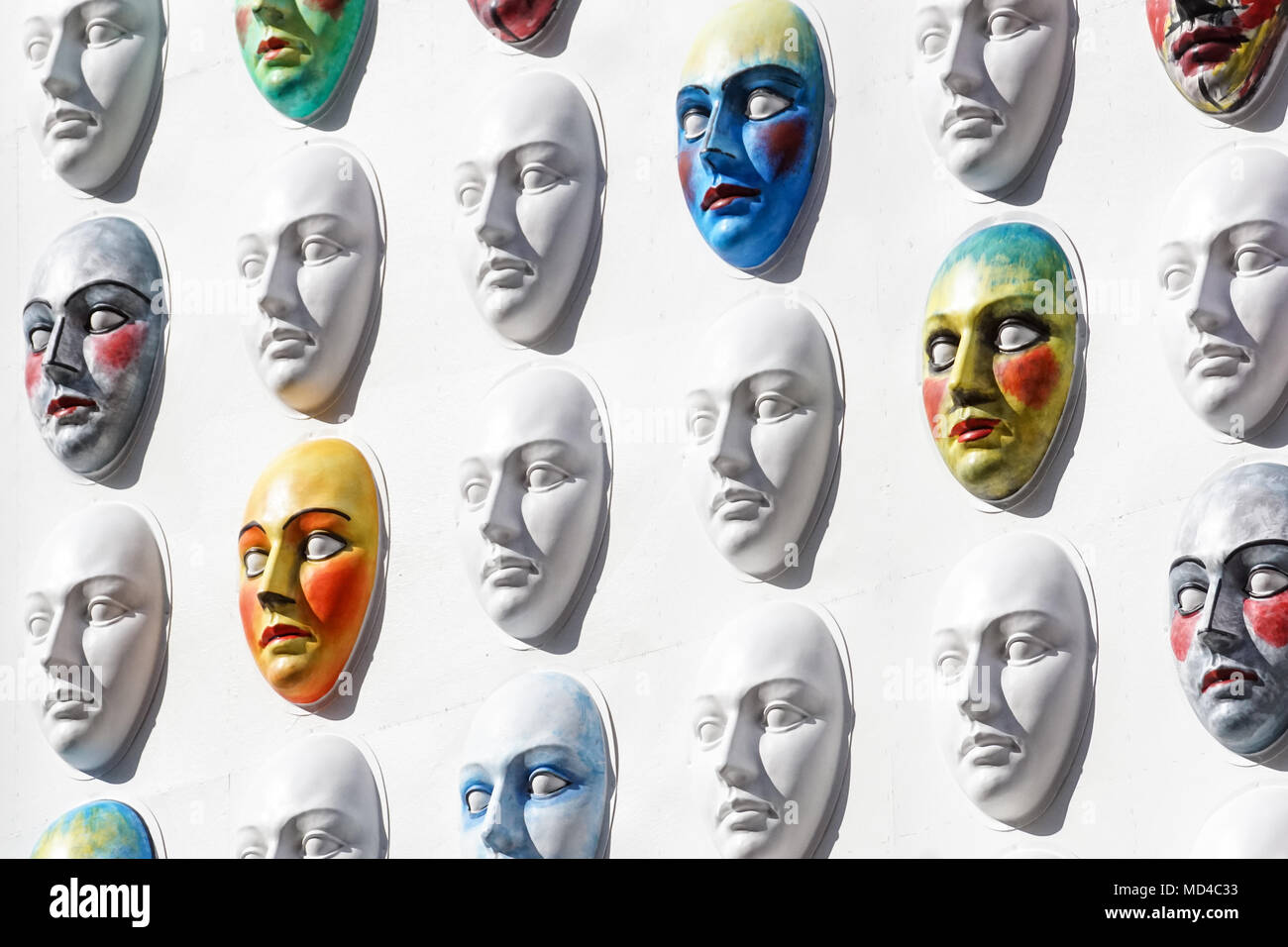 Carnival masks hanging on wall boards lie Stock Photo Alamy