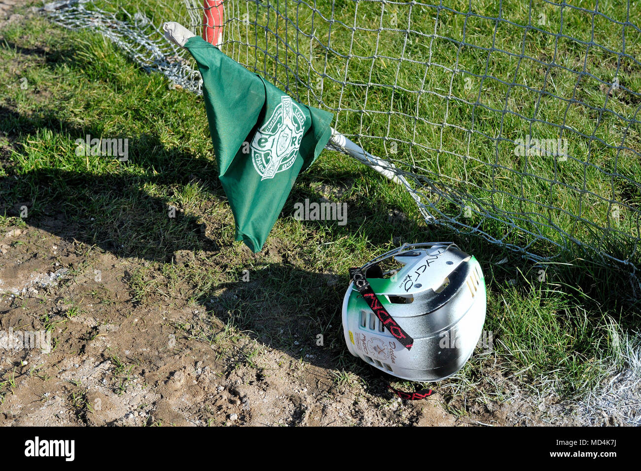 GAA protective hurling helmet and umpires flag at Celtic Park Galic Grounds, Derry, Northern Ireland. Stock Photo