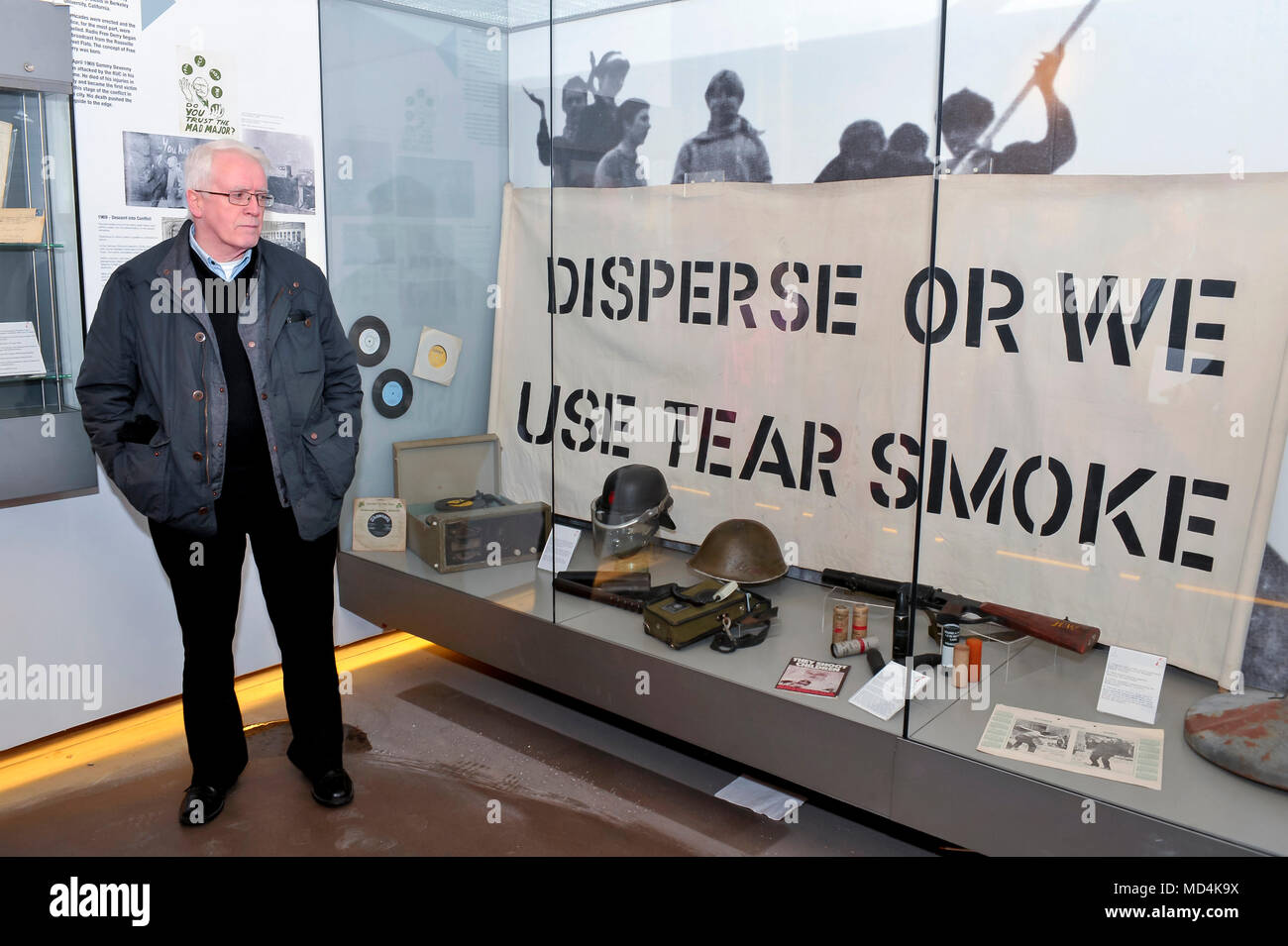 John Kelly, Education Officer Free Derry Museum, pictured with Battle of Bogside exhibits in the museum. Stock Photo