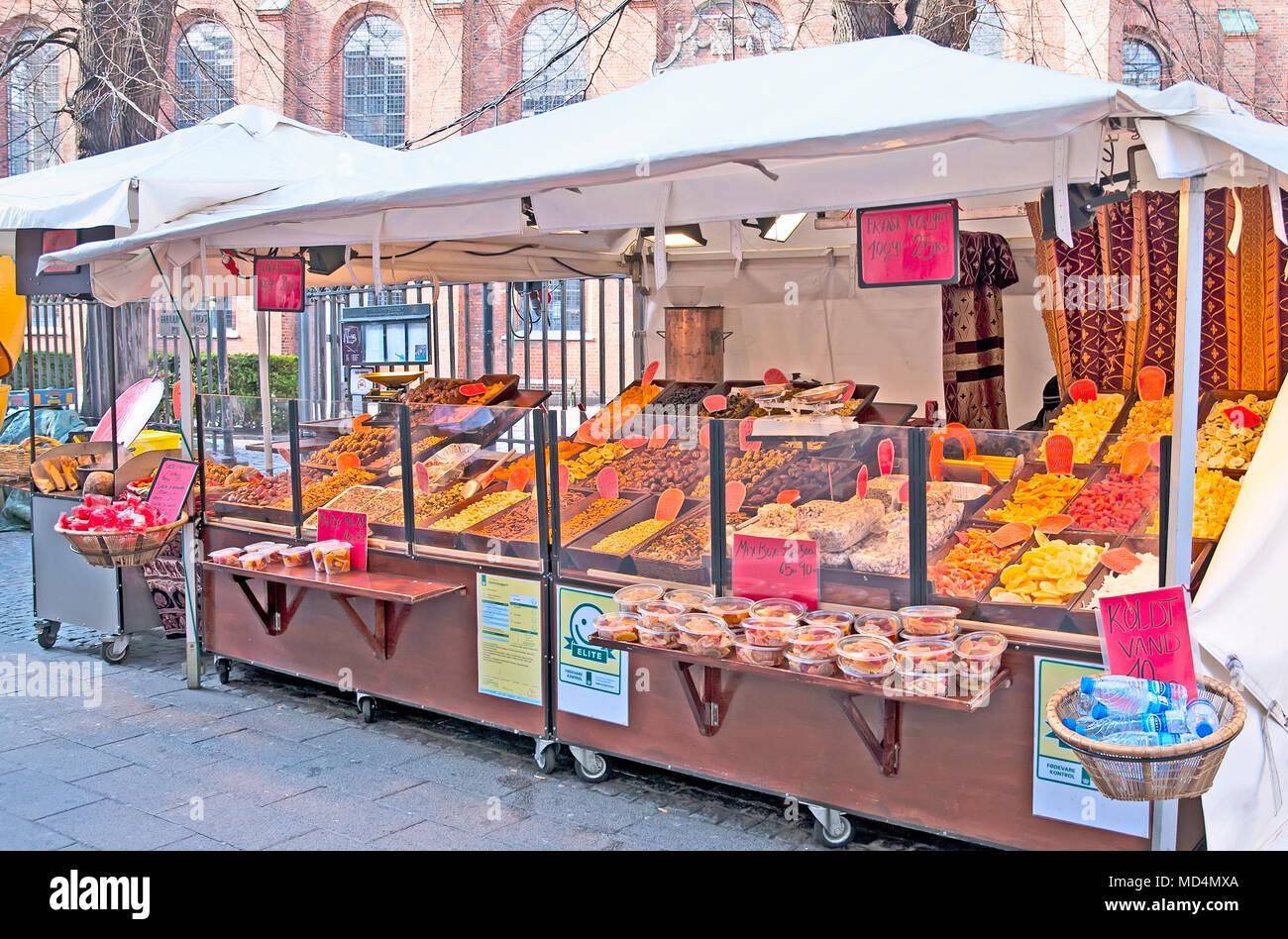 COPENHAGEN, DENMARK - APRIL 13, 2010: Shop with dried fruits, sweets and nuts in the center of the city. Stock Photo