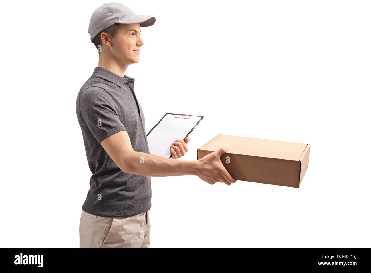 Teenage delivery boy giving a package isolated on white background Stock Photo