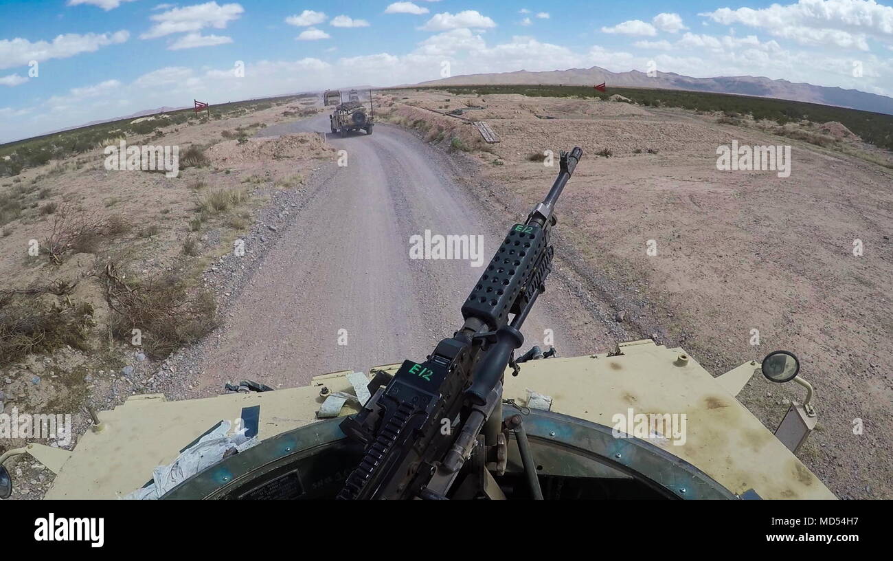 Soldiers assigned to Company J, 123rd Brigade Support Battalion, 3rd Armored Brigade Combat Team, 1st Armored Division, participate in convoy training to prepare for a rotation at the National Training Center at Camp McGregor, New Mexico, March 15, 2018.  Convoy training stresses the importance of communication and develops effective strategies for future combat missions.  (U.S. Army photo by Pvt. Matthew J. Marcellus) Stock Photo