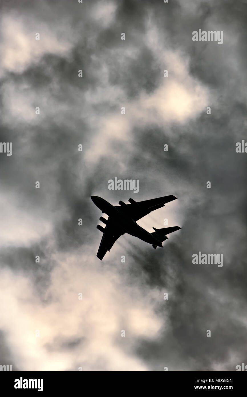 Jet plane on background of cloudy sky, flight and landing Stock Photo ...