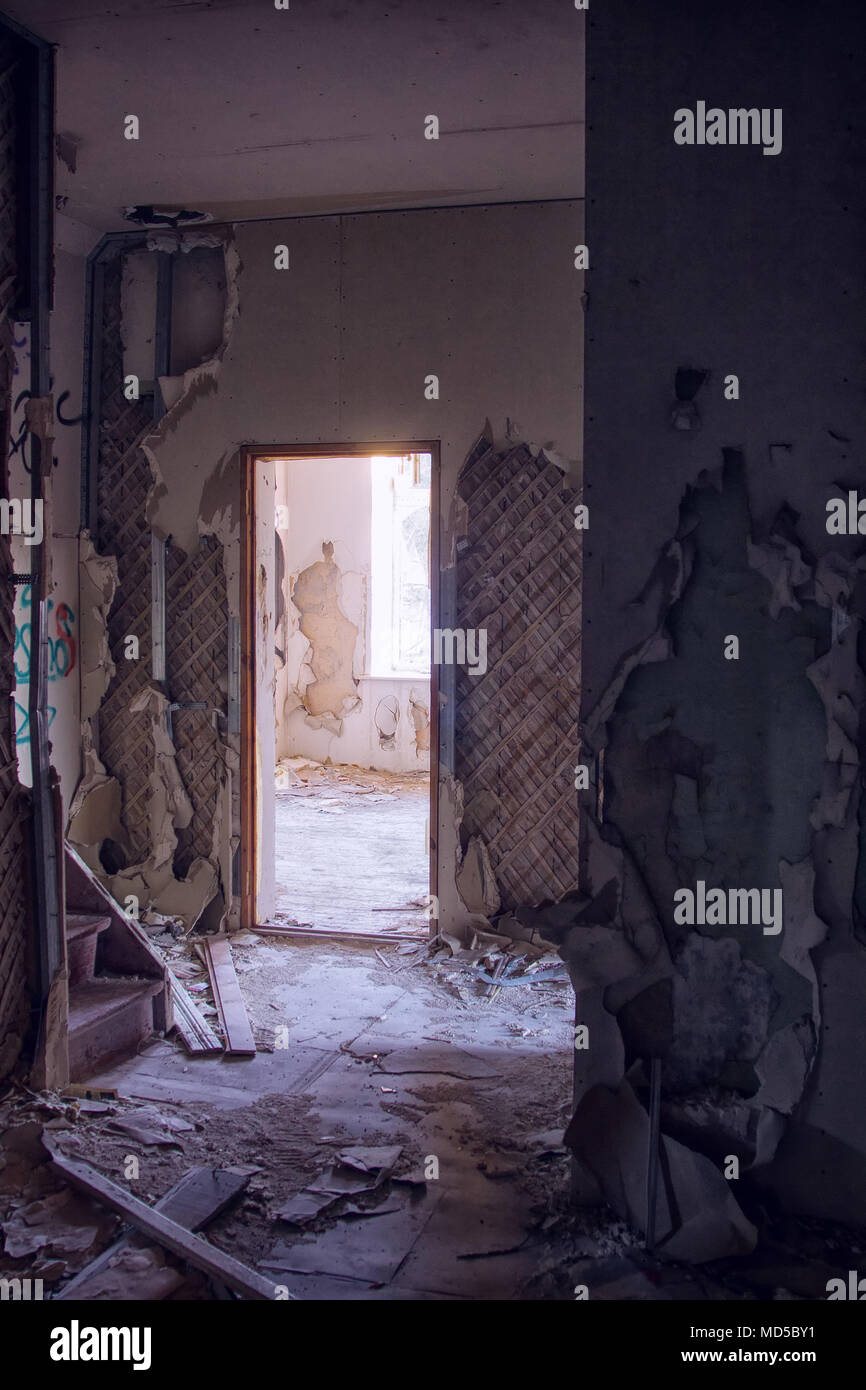 Abandoned houses and flats - a sign of crisis and flight abroad Stock Photo