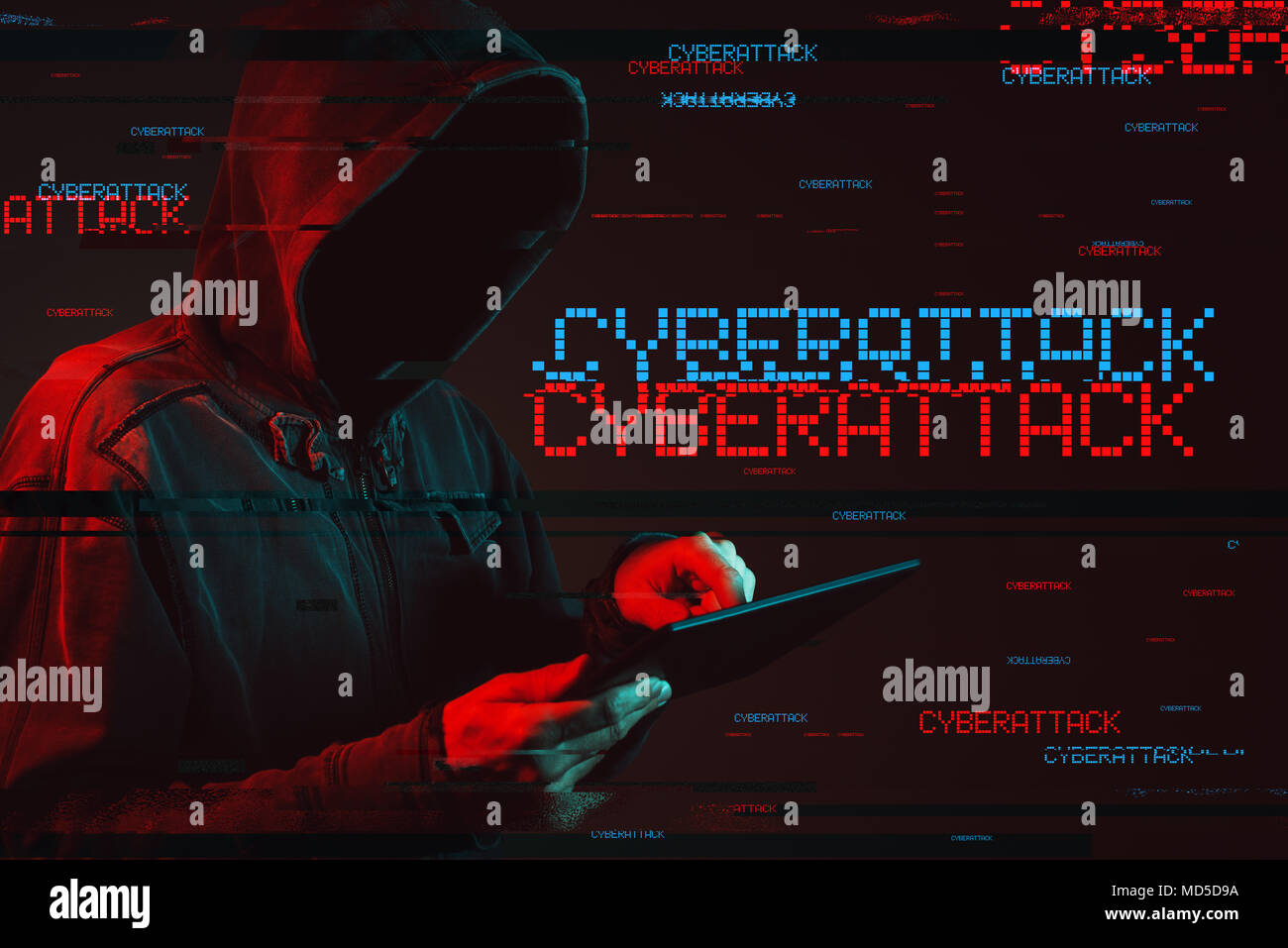 Cyberattack concept with faceless hooded male person using tablet computer, low key red and blue lit image and digital glitch effect Stock Photo
