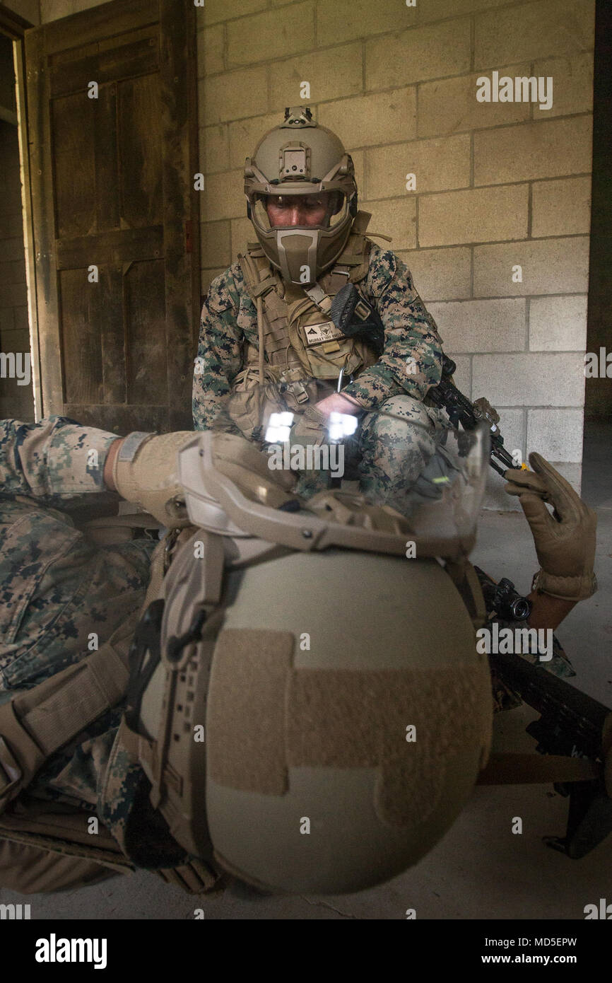 U.S. Marines with 3rd Battalion, 4th Marine Regiment, 1st Marine Division test Step In Visor and Low Profile Mandible during Urban Advanced Naval Technology Exercise 2018 (ANTX-18) at Marine Corps Base Camp Pendleton, California, March 21, 2018. The Marines have been provided the opportunity to assess the operational utility of emerging technologies and engineering innovations that improve the Marine’s survivability, lethality and connectivity in complex urban environments. (U.S. Marine Corps photo by Lance Cpl. Rhita Daniel) Stock Photo