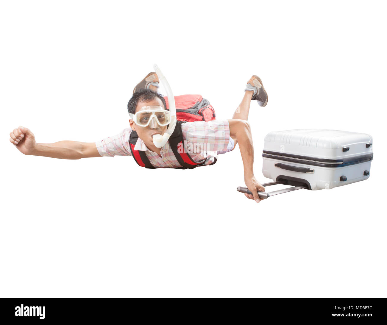 crazy man wearing snorkeling mask flying mid air with traveling luggage isolated white background Stock Photo