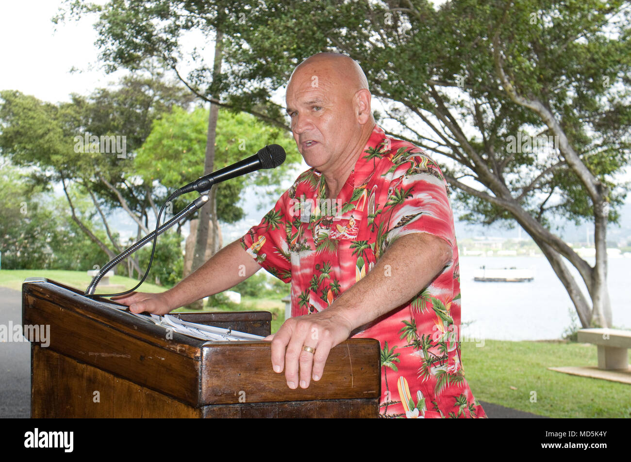 FORD ISLAND — Dennis Drake, public affairs director, U.S. Army Garrison-Hawaii, highlights historical facts about the Dec. 7, 1941 attacks during the Employee Recognition Ceremony at Nob Hill, on Ford Island, March 16, 2018. Employees of U.S. Army Garrison-Hawaii were honored with various awards for achievement, appreciation, length of service and retirement. (U.S. Army photo by Kristen Wong, Oahu Publications) Stock Photo