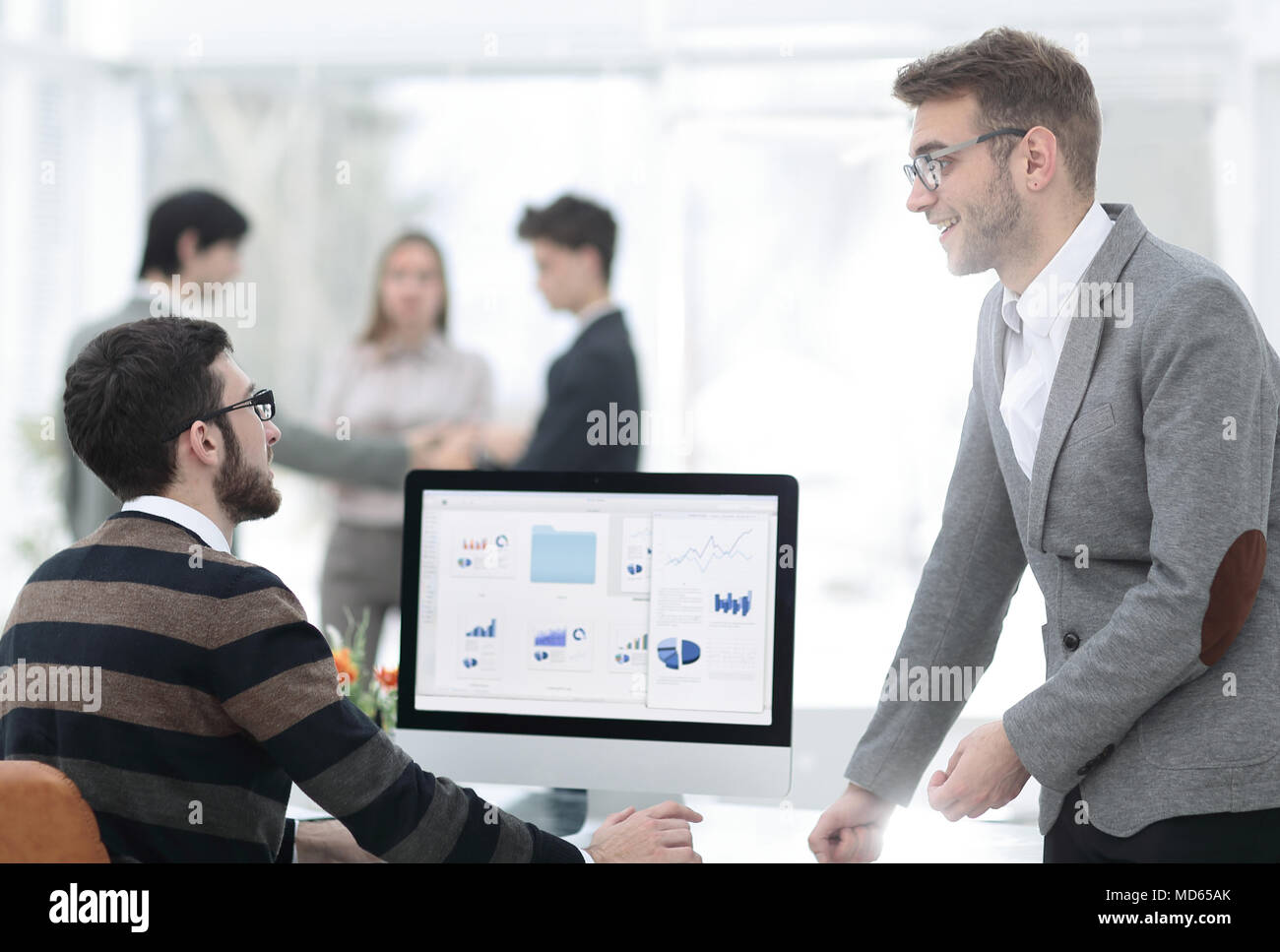 two businessmen analyzing stats financial data Stock Photo