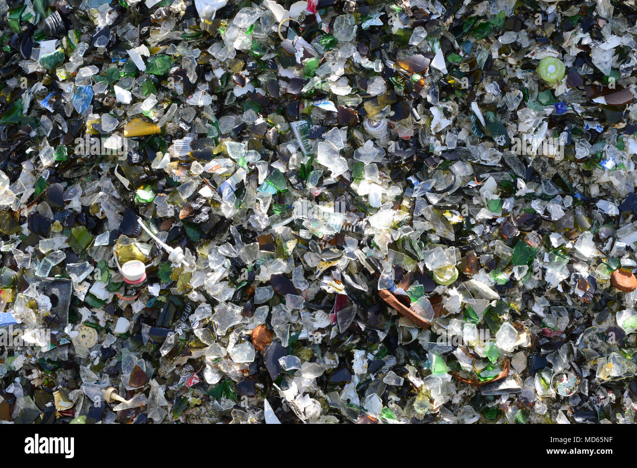 Glass recycling factory in Shetland that breaks down used bottles and jars for use in concrete slabs and sand blasting Stock Photo