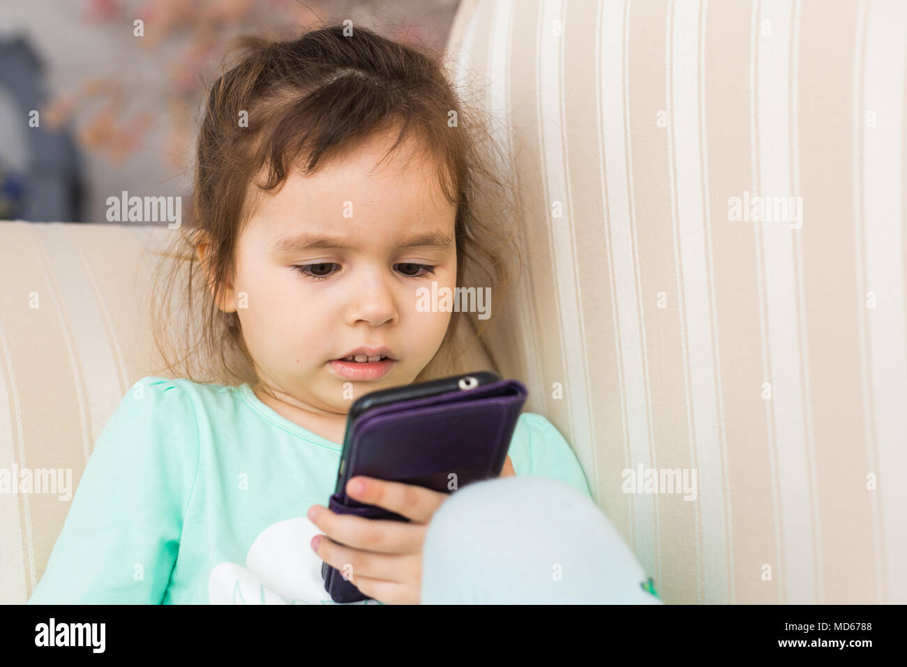 Portrait Of Pretty Baby Talking On Mobile Phone. Isolated Over White Stock  Photo, Picture and Royalty Free Image. Image 4210737.