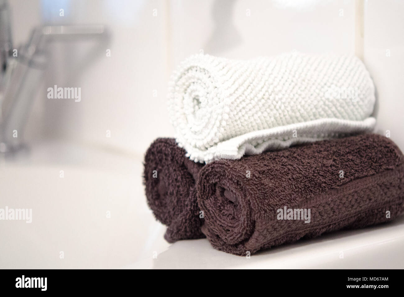 Rolled up towels in bathroom hires stock photography and images Alamy
