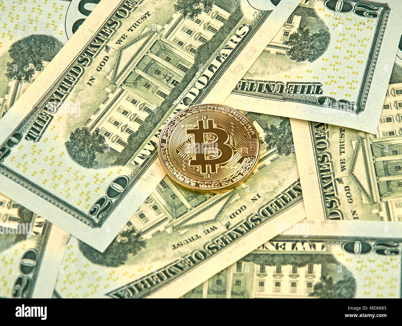 MONTREAL, CANADA - MARCH 10, 2018: Bitcoin cryptocurrency gold coin and  logo on american dollar bank notes Stock Photo - Alamy
