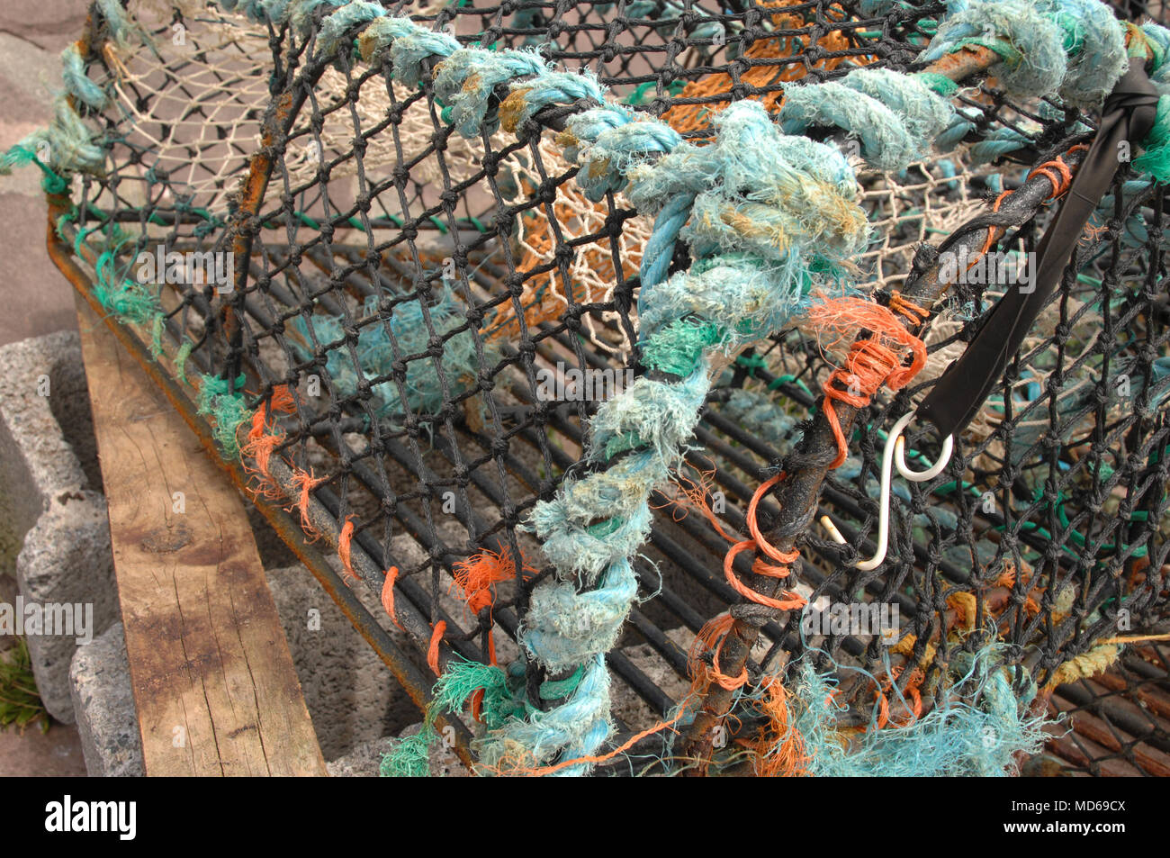 Lobster Pot on the Westcoast of Ireland with Old Rope and Twine attached Stock Photo