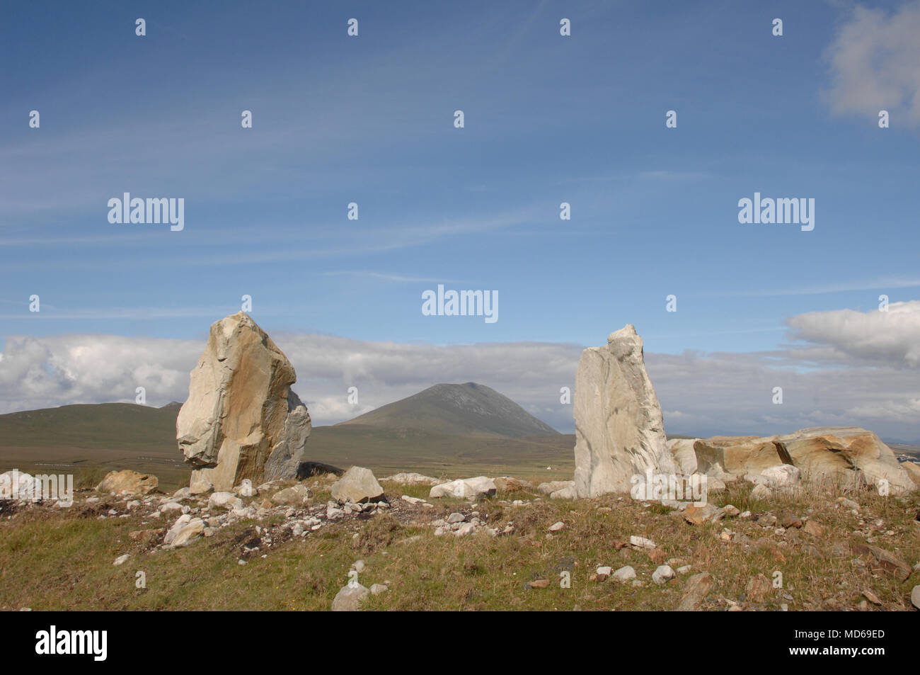 Twin Standing Stones with view of Mountain in between on the Westcoast of Ireland Stock Photo