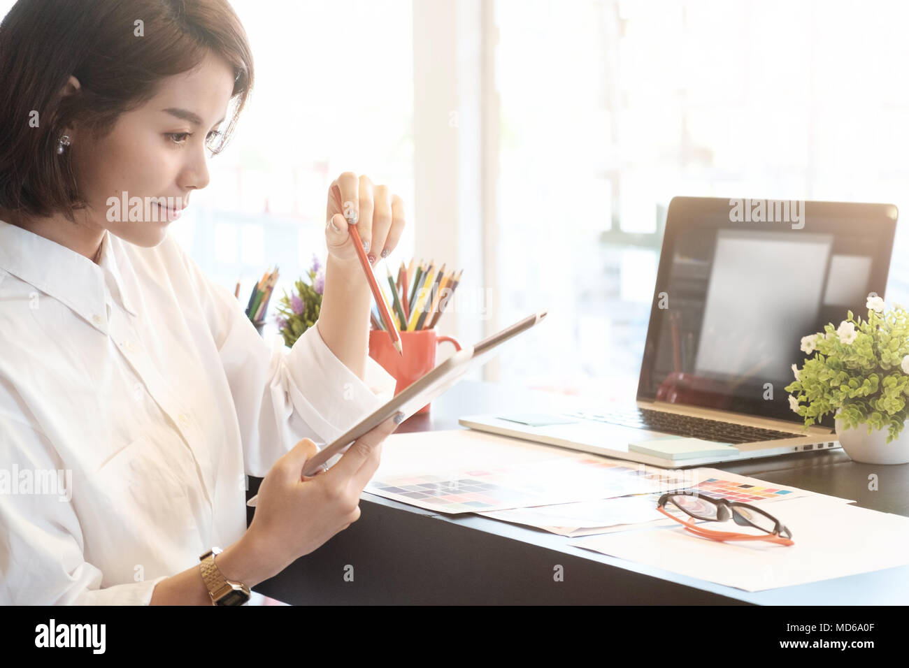 Cropped shot of Graphic designer woman creative on artist workplace. Stock Photo