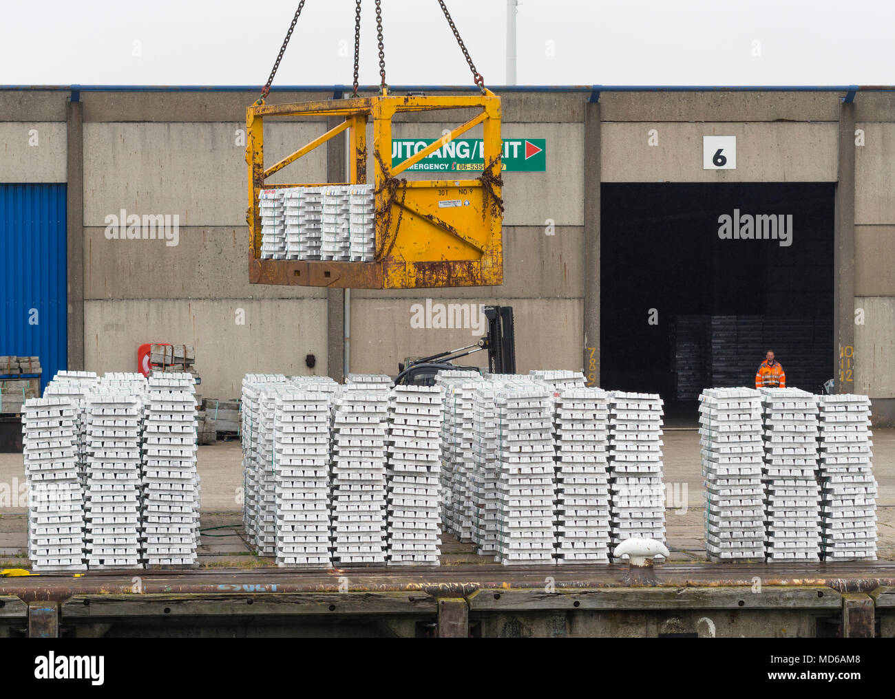 Rotterdam, Netherlands - 20 July 2015: Pallets with ingots of zinc are prepared for shipping at Europort Rotterdam, Europe's largest freight harbour. Stock Photo