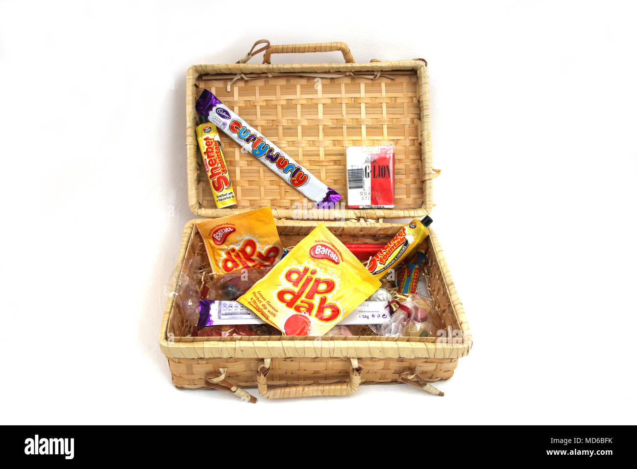 Hamper Filled With Retro Sweets and chocolate Stock Photo