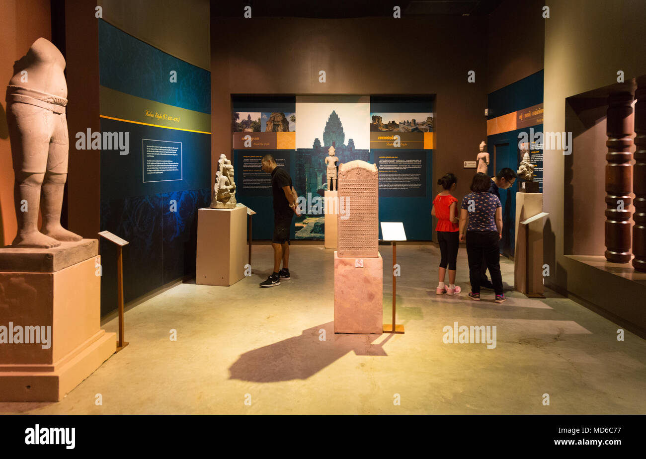Visitors looking at exhibits in the Angkor National Museum, Siem Reap, Cambodia Asia Stock Photo