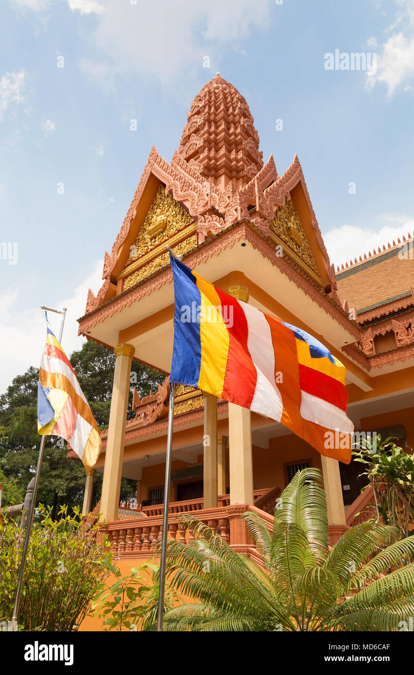 Buddhist flag flying outside a buddhist pagoda temple, Siem Reap Cambodia Asia Stock Photo