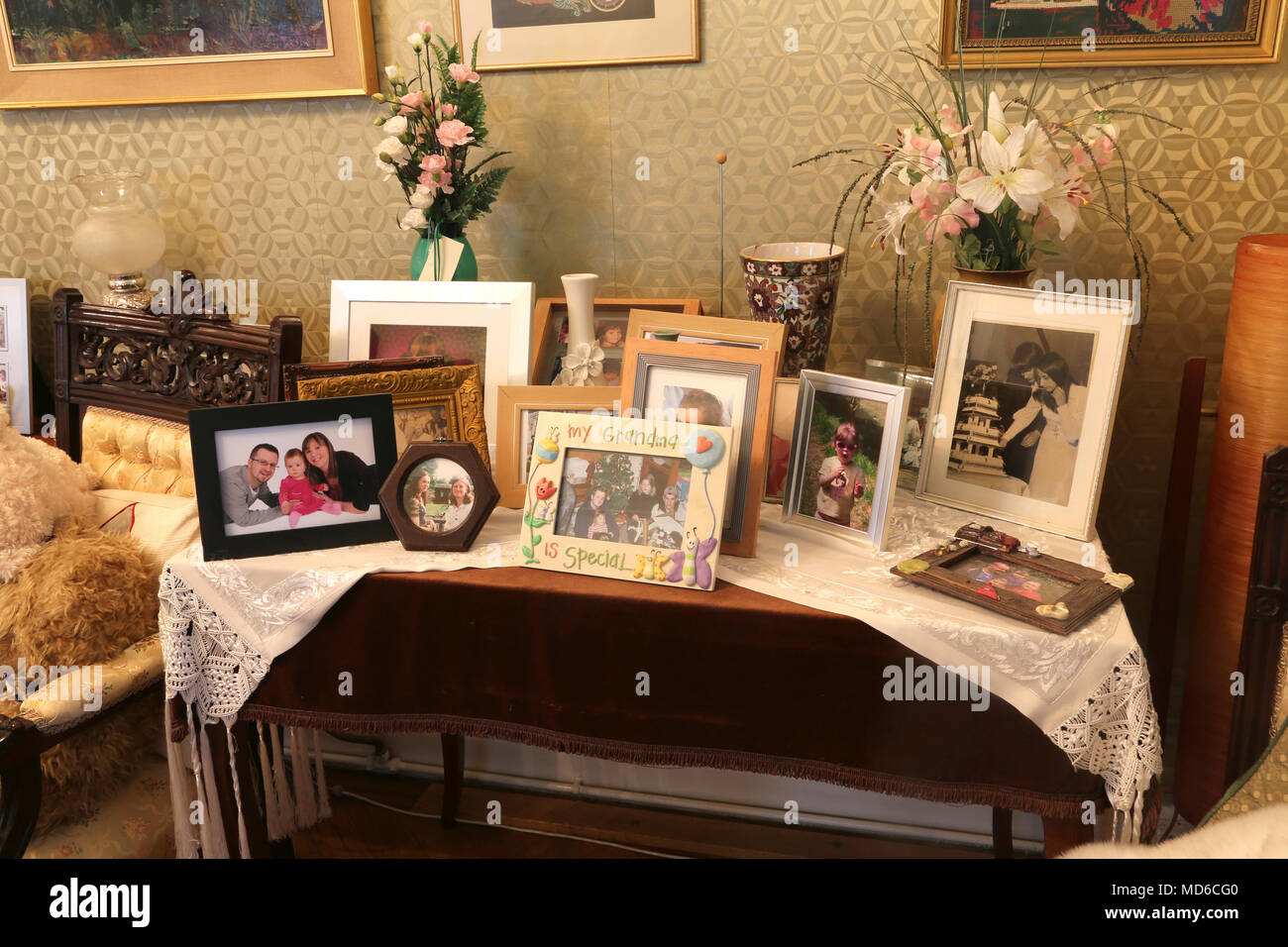 Family Photos on Side Table in Home Surrey England Stock Photo