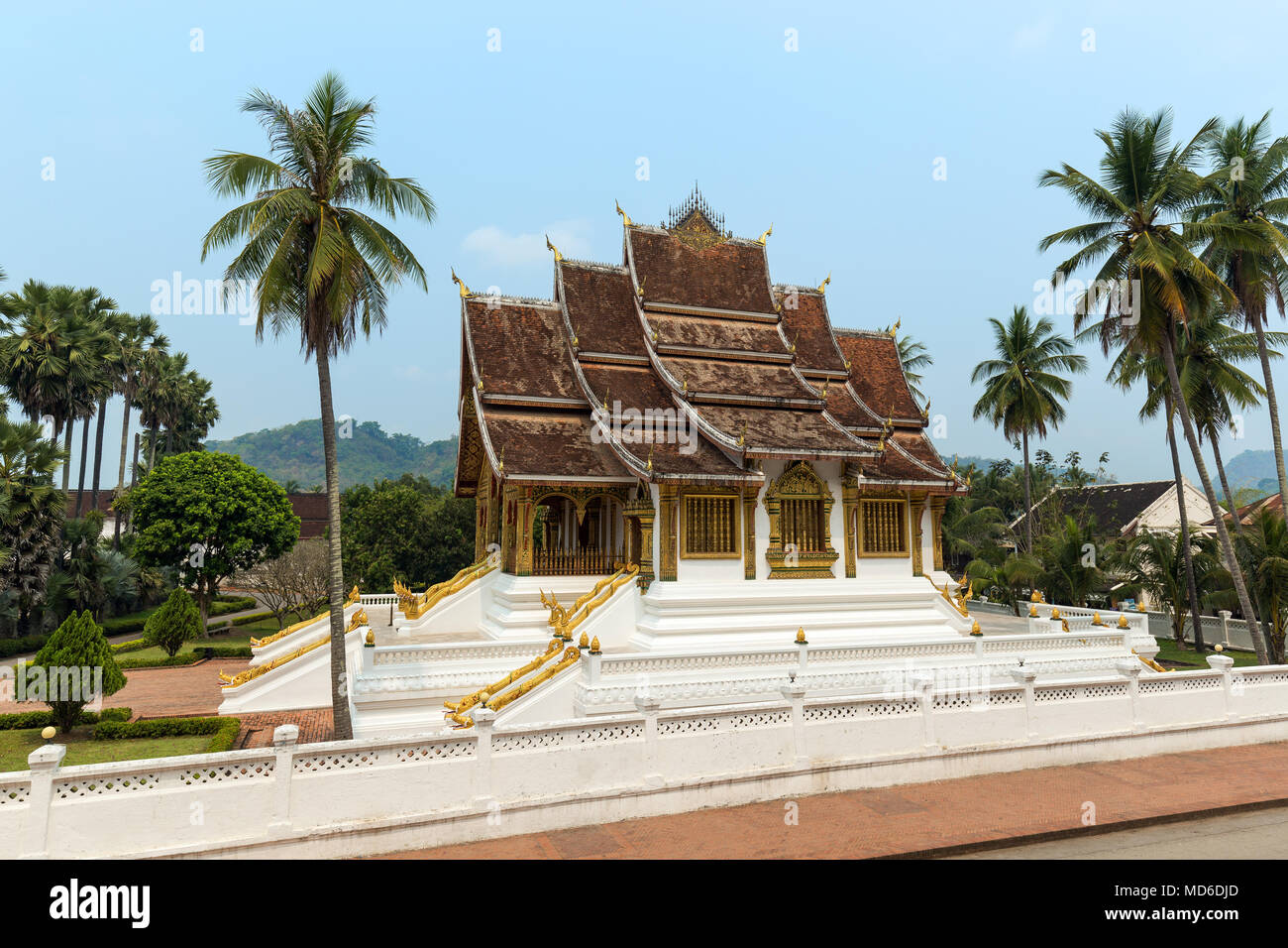 View of the ornate Haw Pha Bang temple, also known as Royal or Palace Chapel. It's located next to the Royal Palace in Luang Prabang, Laos. Stock Photo