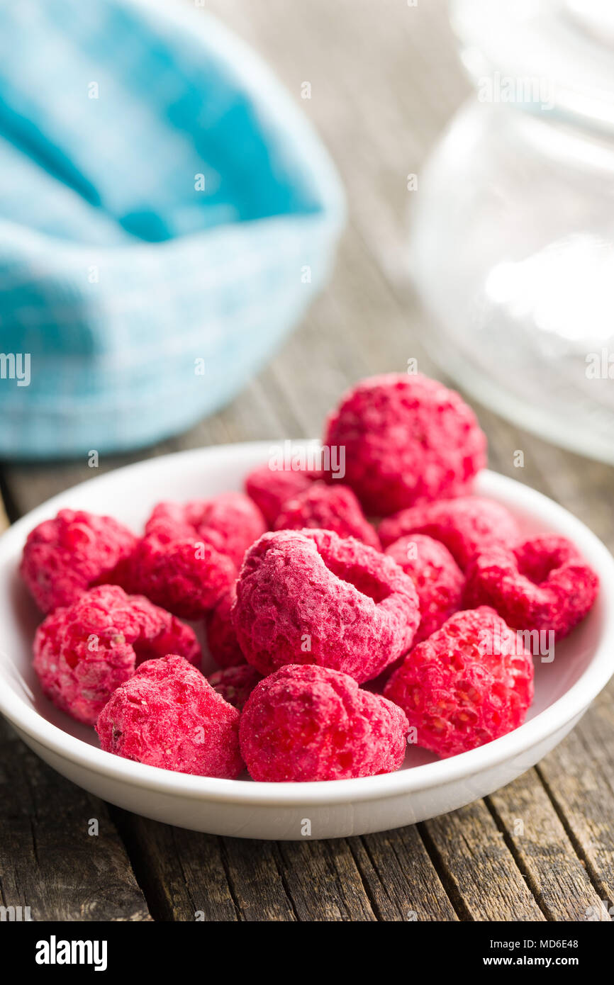 Freeze dried raspberries in bowl Stock Photo Alamy