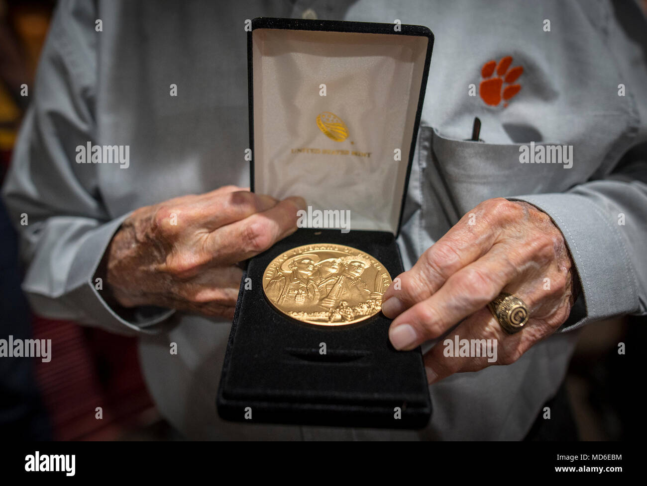 100-year-old Bataan Death March survivor Col. Ben Skardon, a revered Clemson University alumnus and professor emeritus, holds his Filipino World War II Veterans Congressional Gold Medal after a ceremony at White Sands Missile Range, March 24, 2018. (Photo by Ken Scar) Stock Photo