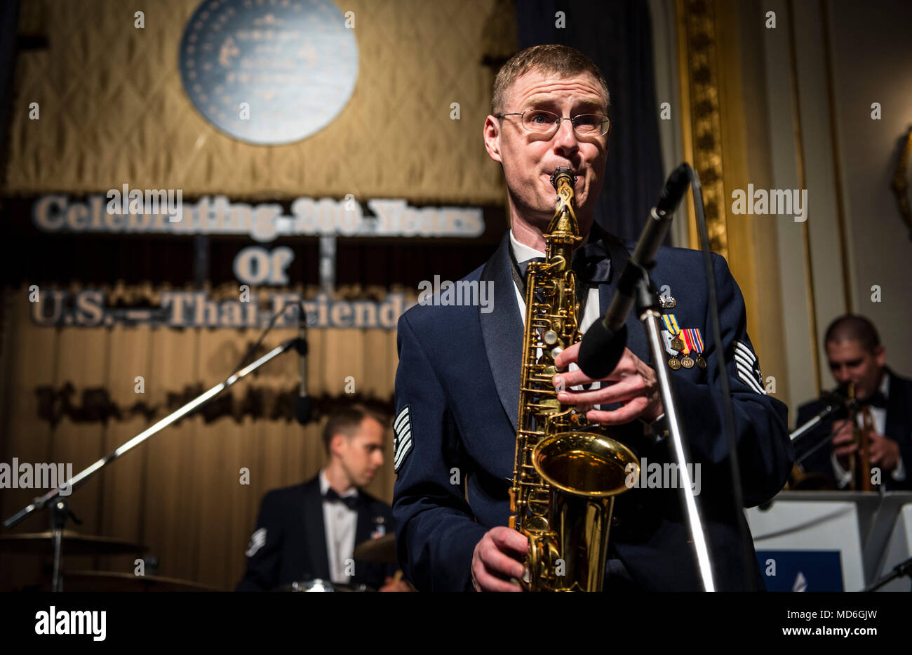 180323-F-PW498-001 BANGKOK, THAILAND (Mar. 23, 2018) Technical Sergeant Ron Glenn, a regional saxophonist assigned to the U.S. Air Force Band of the Pacific, performs at a gala at the Mandarin Oriental Hotel in Bangkok, Thailand. The band is in Thailand as part of the U.S. Embassy’s 200th Anniversary Celebration of Friendship between the U.S. and Kingdom of Thailand. (U.S. Air Force photo by Technical Sergeant Mariko Frazee/Released) Stock Photo