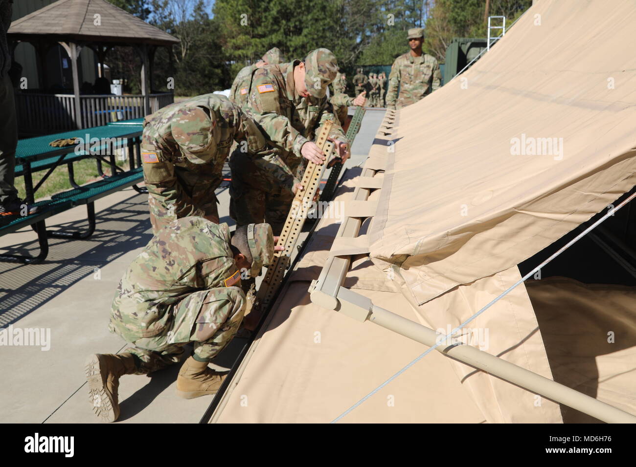 Joint Mortuary Affairs Center at Fort Lee, Virginia, trains U.S. military personnel in mortuary affairs operations. The archival image documents construction of wall braces for a Mobile Integrated Remains Collection System, a Joint Mortuary Affairs Center at Fort Lee, Virginia, trains U.S. military personnel in mortuary affairs operations. The archival image documents construction of wall braces for a Mobile Integrated Remains Collection System, a